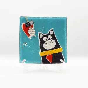 Concave glass plate with cat design.